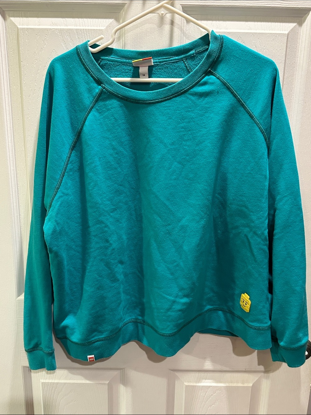 Lego Teal Crewneck Sweatshirt with Yellow Minifigure Patch